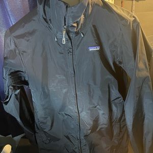 Unisex Patagonia Size medium light weight Patagonia hooded rain jacket